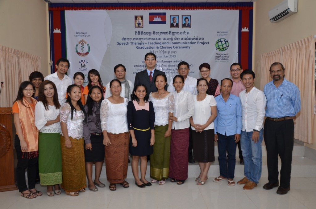 Several trainees graduated from the SIF's speech therapy training project on 27 Oct, 2013. Singapore Ambassador to Cambodia Mr Kevin Cheok (middle, back row) presented the graduate certificates, with Ms Anita Fam, SIF Governor (second from right, back row) and Dr Bhoomikumar Jegannathan, CCAMH Programme Director (far right, front row) attending the ceremony.