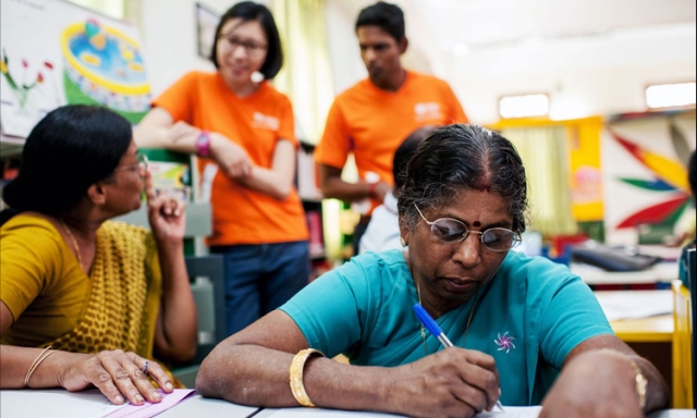 Our Singapore International Volunteers Dilip Kumar and Joanne Koh from NLB, are sharing with Jaffna librarians, outreach activities that spur the interests of youths in acquiring conversational English skills.