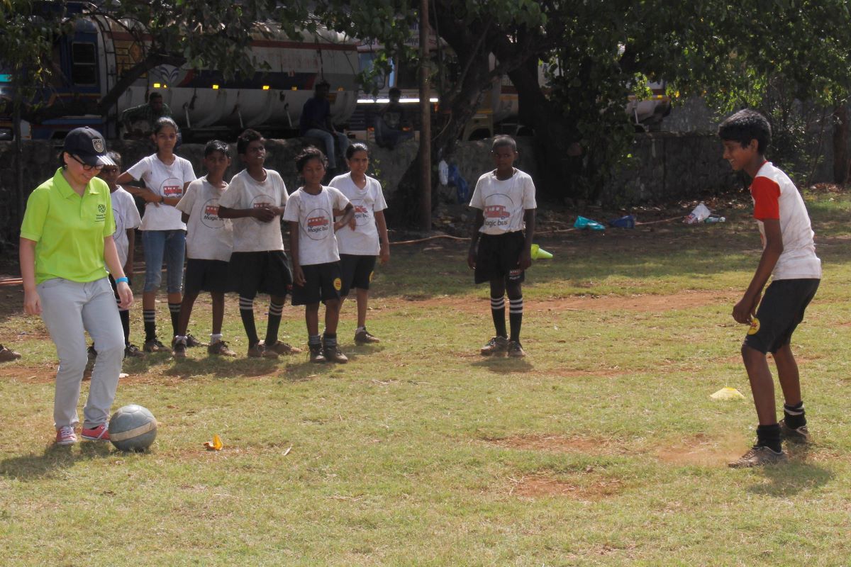 Ready.. Steady.. Strike! - Yee Chong, SIF's 2014 YSE participant from team UBUNTU, having a ball with children from #MagicBus, a non-profit organization set up with the mission of ensuring India’s poorest children and youth to move out of poverty.