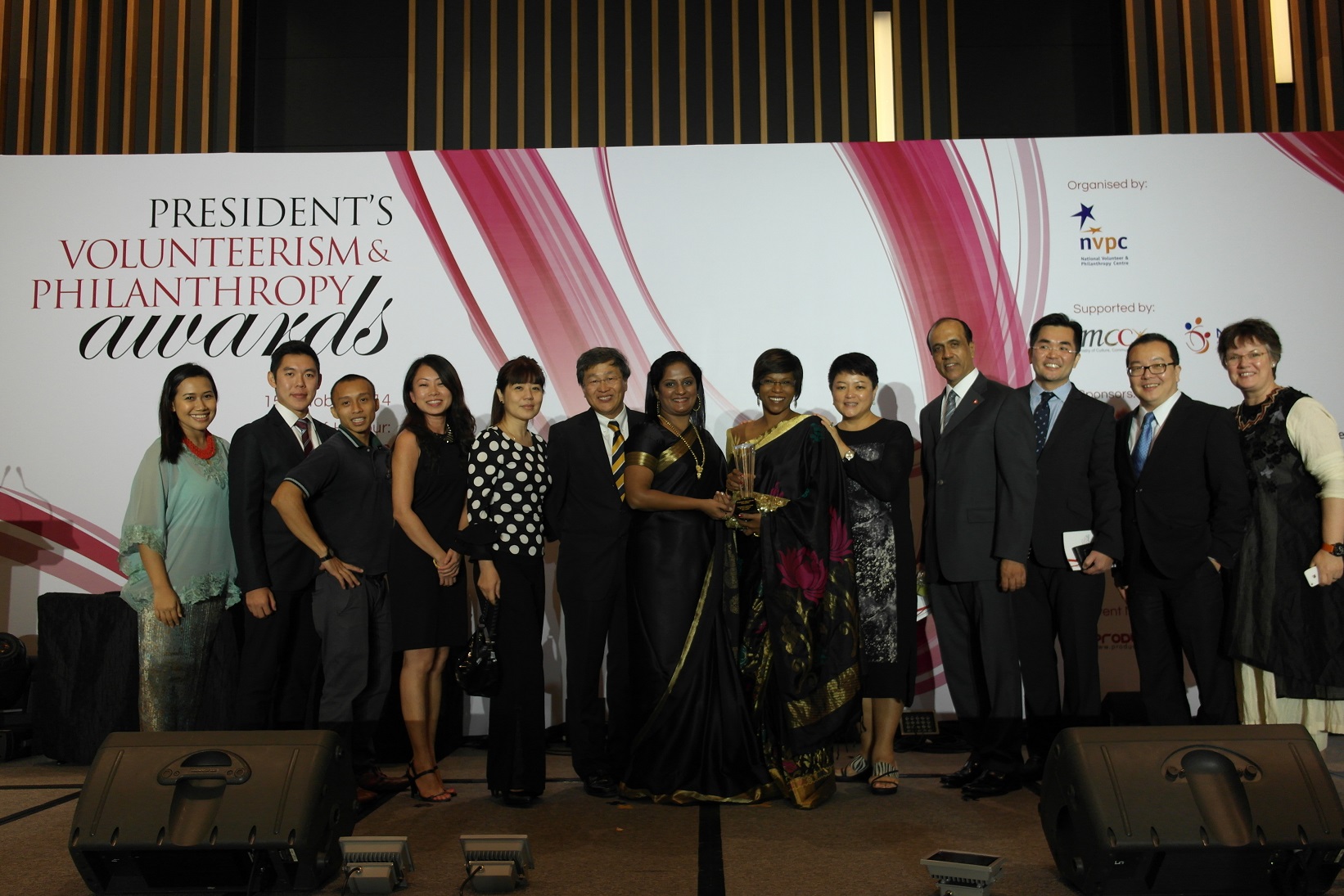 The award honours the more than 3,500 SIVs, whose hard work, dedication and passion have made a difference and uplifted lives in communities across 17 countries over the past two decades. Among them pictured here, Yusof Yakob (third from left), A/Prof Anette Jacobsen (extreme right) and Dr R Akhileswaran (fourth from right).
