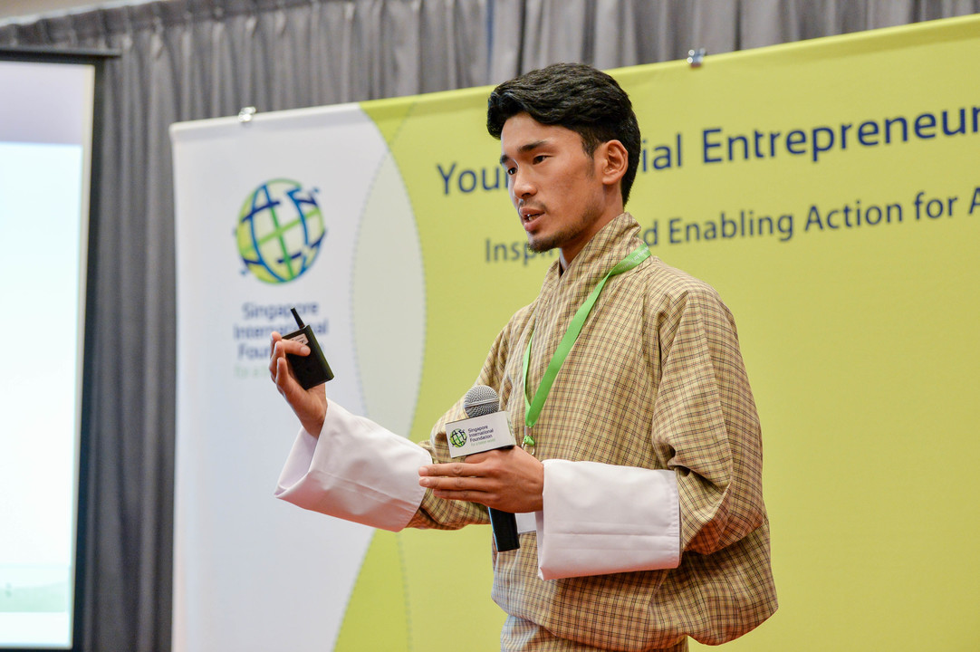 Bhutanese participant Sherab Dorji explaining about his social enterprise