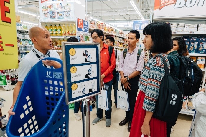 How can public spaces be more inclusive for people with disabilities? At the Enabling Village, our media friends learn how technology can be used to make shared facilities accessible for everyone in the community, such as through automated grocery baskets.