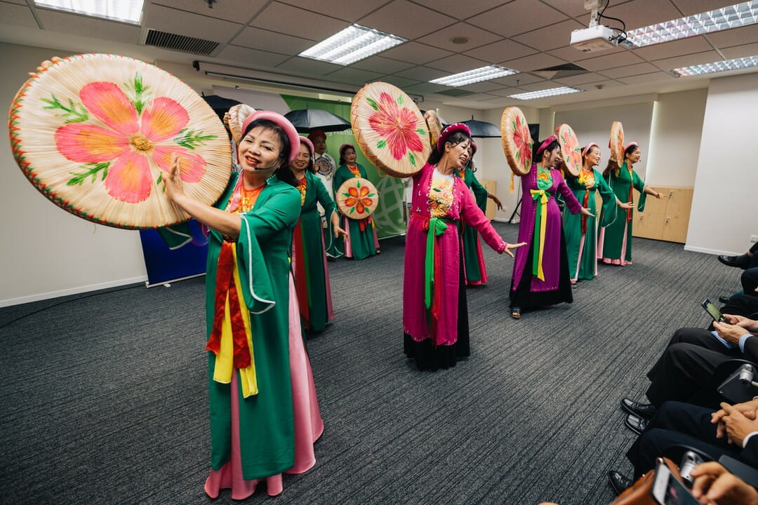 A Vietnamese community-based arts group performs a vibrant cultural dance at SIF Connects! Hanoi. The dance was choreographed by SIF's 2018 Arts for Good Fellow Ms Pham Thi Hong (not pictured).