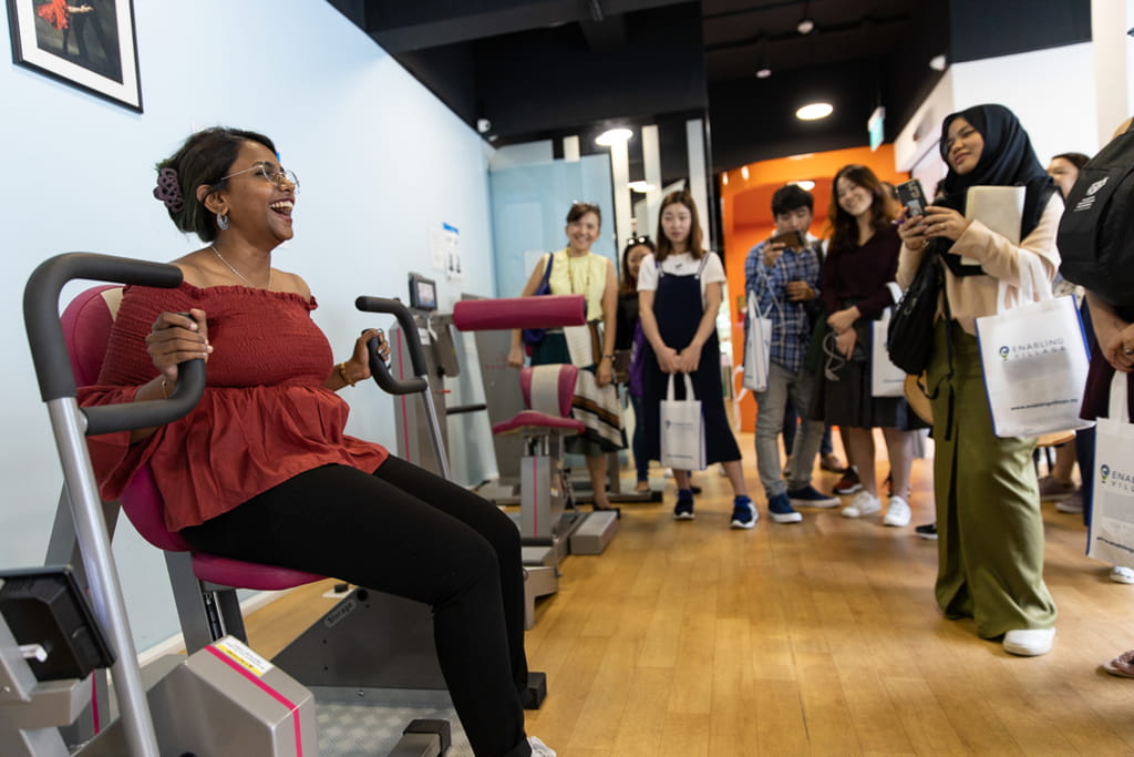 The influencers tested machines at an inclsuive gym for people of different abilities. The gym is in the Enabling Village, an inclusive community space staffed by able-bodied and disabled individuals to prepare and enable people with disabilities to contribute to society. 