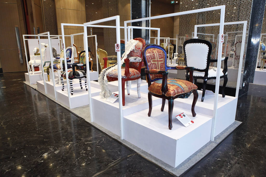 Chairs designed by 50 Indonesian and Singaporean artists on display during the Chairity Evening.