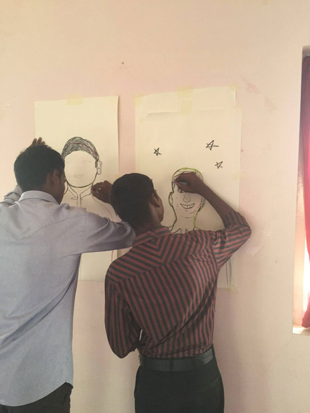 Workshop participants gain a deeper understanding of themselves through the drawing of self-portraits.