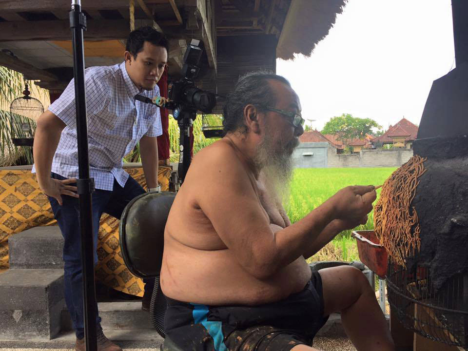 Indonesian artist Made Kedol working on his chair for the Chairity project.