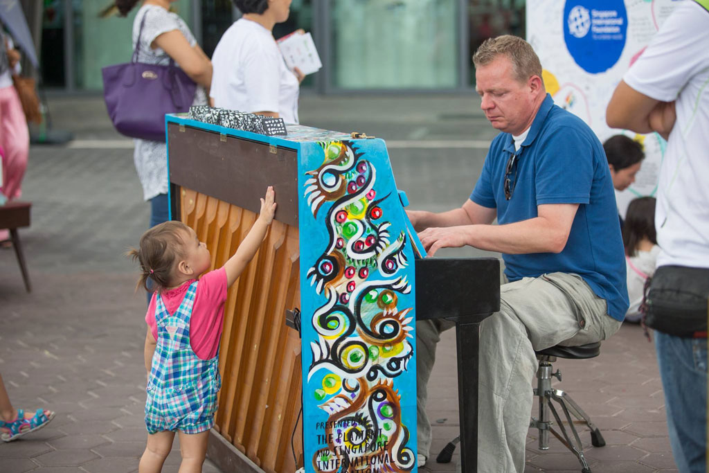 From the young to the old, enthusiasts try their hands playing on pianos beautifully decorated by 25 artists along with social enterprises and social welfare organisations at ‘Play Me I’m Yours.’