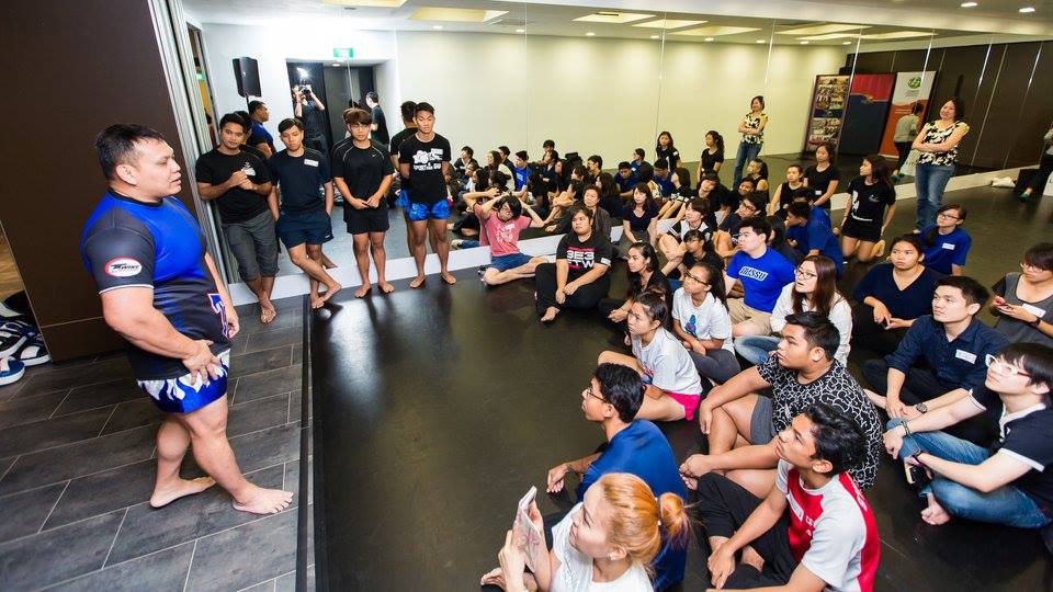 Volunteer trainers from Fitness First showcasing various kinds of martial arts in Singapore.
