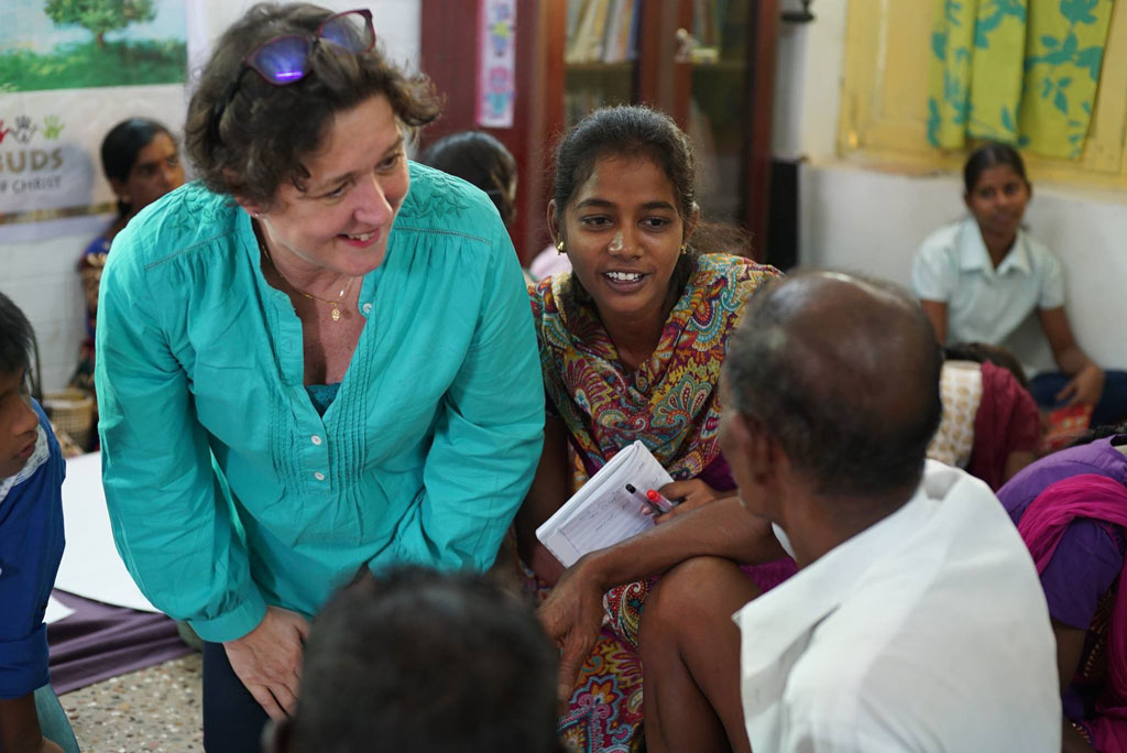 Art educator Dr Esther Joosa (left), guiding workshop participants during an individual mentoring session to enabling action for positive impact and cultural awareness in a local community affected by HIV.