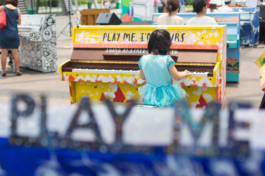 From the young to the old, enthusiasts try their hands playing on pianos beautifully decorated by 25 artists along with social enterprises and social welfare organisations at ‘Play Me I’m Yours.’