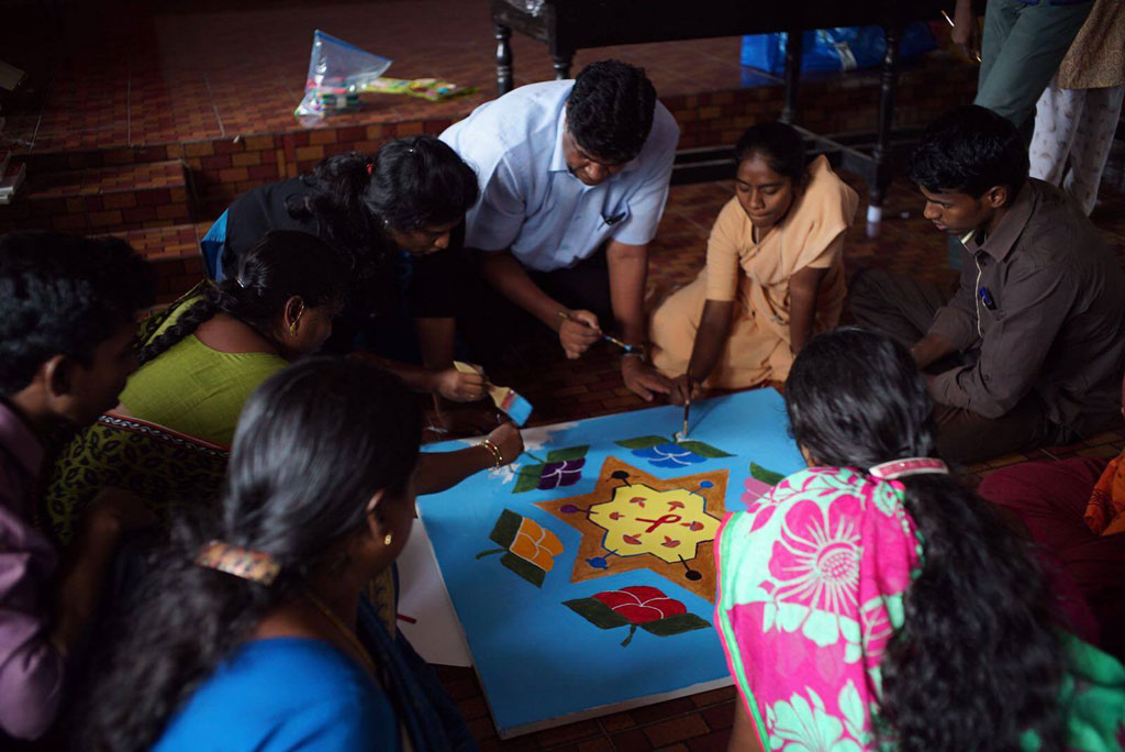 Workshop participants share insights to India through the painting of the Kolam.