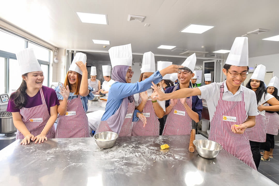 Participants bond over a team-building activity led by Shanghai Young Bakers, an organisation under Chi Heng Foundation that provides free French bakery training to marginalised Chinese youth, empowering them to find employment after graduation.