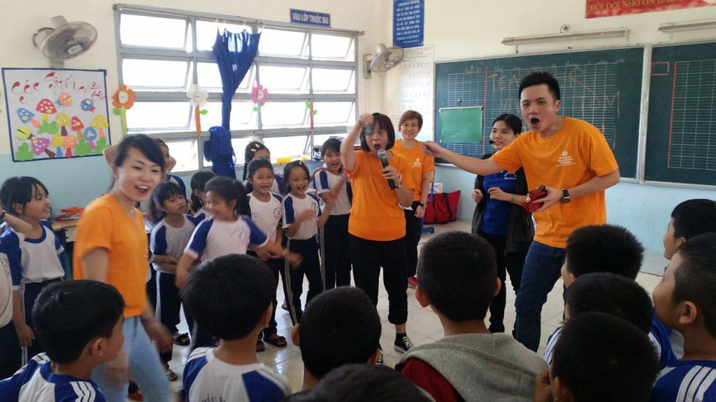  Our Singapore International Volunteers using a variety of props to make their English language classes more engaging and interesting.
