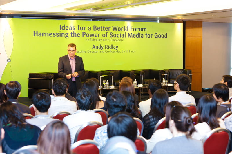 The keynote speaker issues the 2012 Earth Hour Challenge of “I Will If You Will” to the over 200 participants at the forum