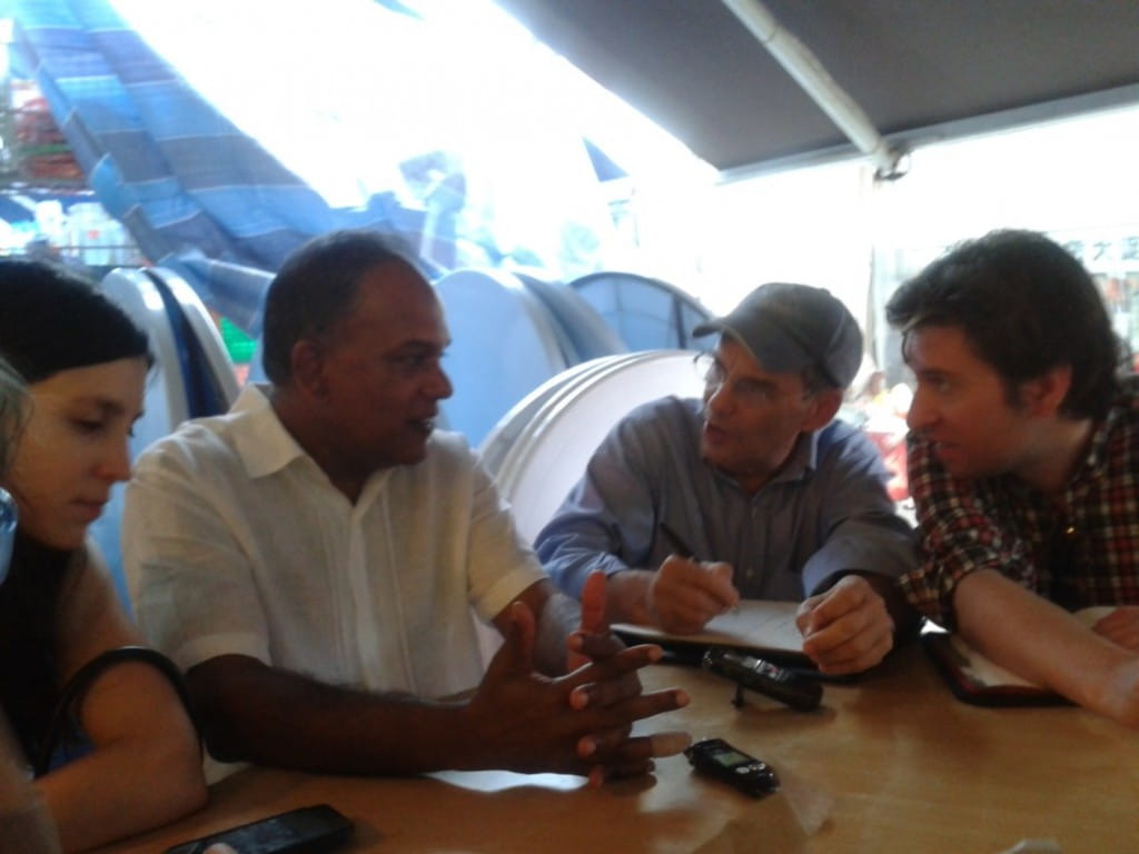 The journalists engaging in a lively coffee session debate with Minster after participating in a walkabout session starting at Chong Pang Community Club.