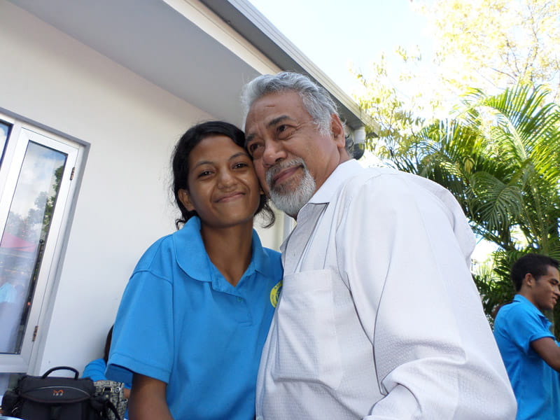 Student Crecencia beams with joy.