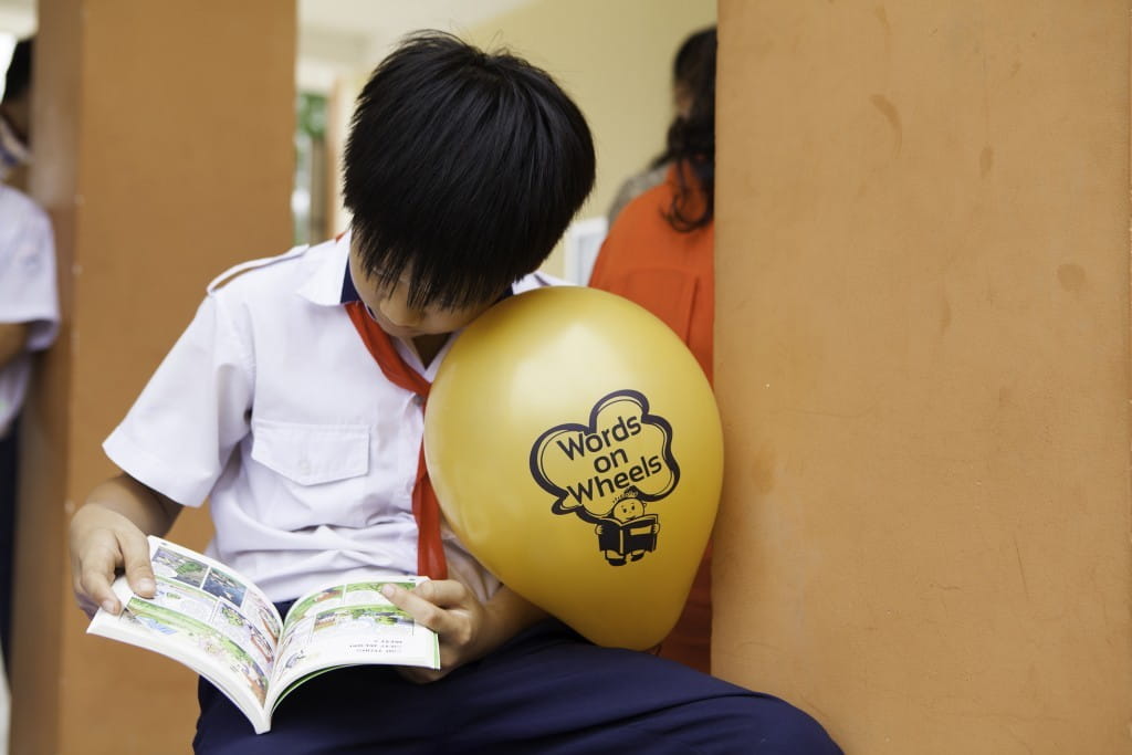 Student at Le Minh Xuan Secondary School engrossed in his book.
