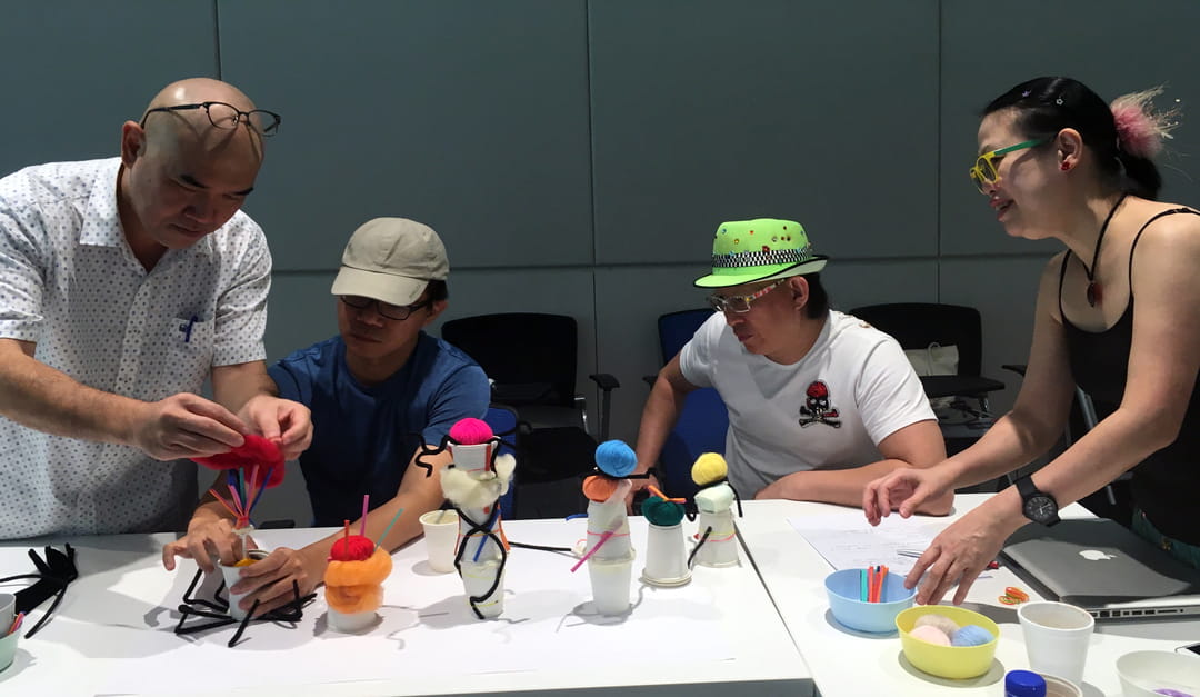 (From left) Sync participants Malaysian Anuar Lim and Singaporeans Alvan Yap, Raymond Lau and Dawn-joy Leong created models of allies in the disability arts sector during an exercise during the five-day workshop.