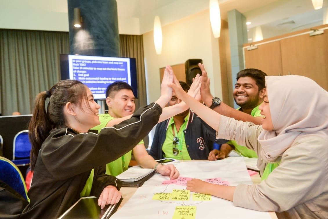 Participants bonding at the Theory of Change session conducted by Just Cause. Theory of Change is a planning methodology that allows impact-driven organisations to understand existing gaps in their work that are preventing them from achieving their desired goals.