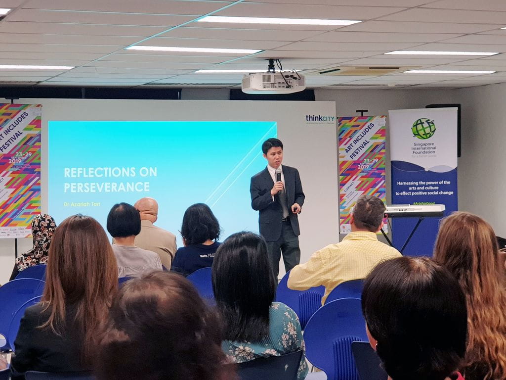 Dr Azariah Tan (standing), a celebrated Singaporean pianist with bilateral sensorineural hearing loss, sharing about his musical journey in the face of adversity. Close to 100 participants from the education, social and private sectors attended the two-day conference which saw talks, workshops and panel discussions delivered by local and international speakers.
