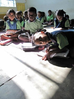 Despite not having desks and chairs, students at the Parikrama Foundation are eager to learn.