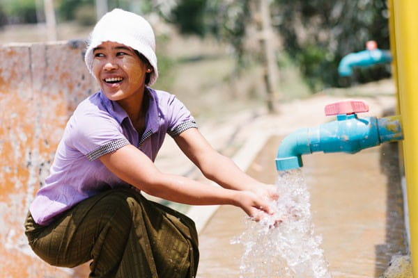 Nwenwe Hleing, 39, one of Zee Kone's villagers who can now enjoy clean drinking water from the new Water for Life (Yangon) tube well. (Photo credit: Foo Chee Chang)