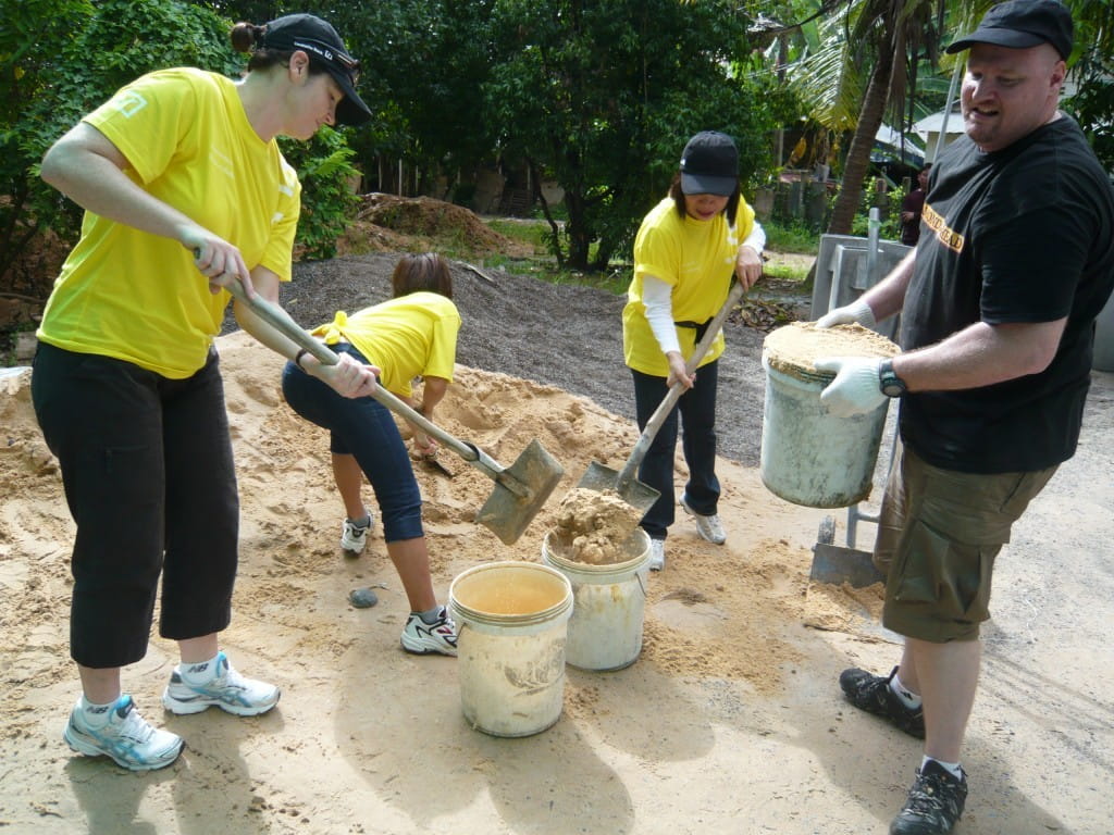 Annie (second from right) doing her part to uplift communities in Cambodia.