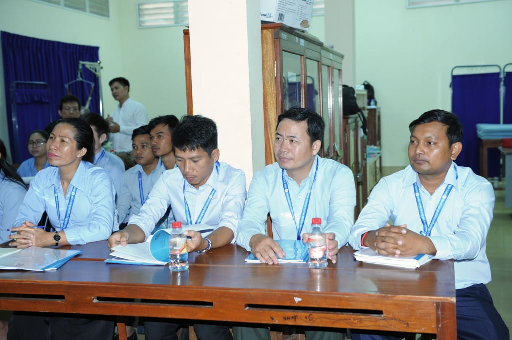 The first student cohort of the Physiotherapy Bachelor Bridging Programme learning about the upcoming curriculum and assessment during orientation after the launch ceremony in Phnom Penh, Cambodia.