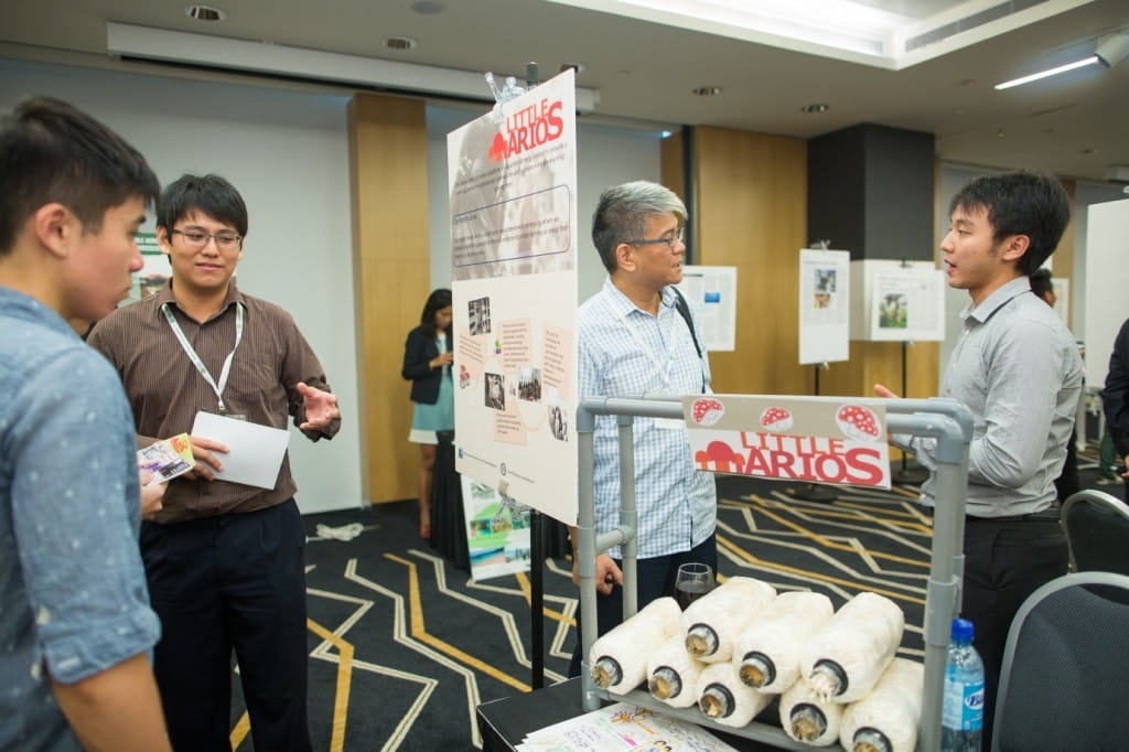 Little Marios from Malaysia introducing their idea to empower underserved communities with mushroom farming.