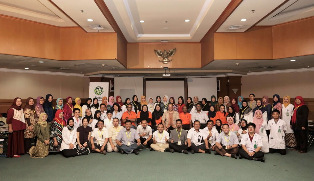 Singaporean and Indonesian healthcare practitioners take a commemorative group photo at the end of the training sessions of the newly-launched Paediatric Emergency & Neonatal Care Project aimed to augment the quality of paediatric emergency and neonatal care in East Java, Indonesia.